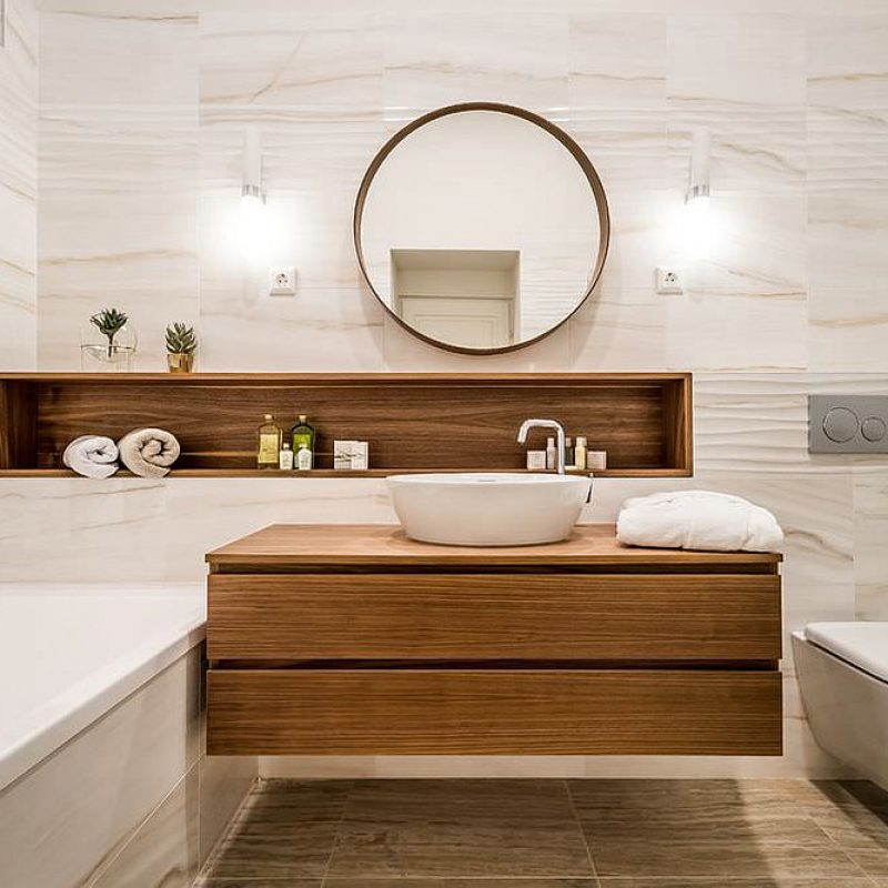 Minimal-and-modern-white-bathroom-with-wood-sections-and-vanity